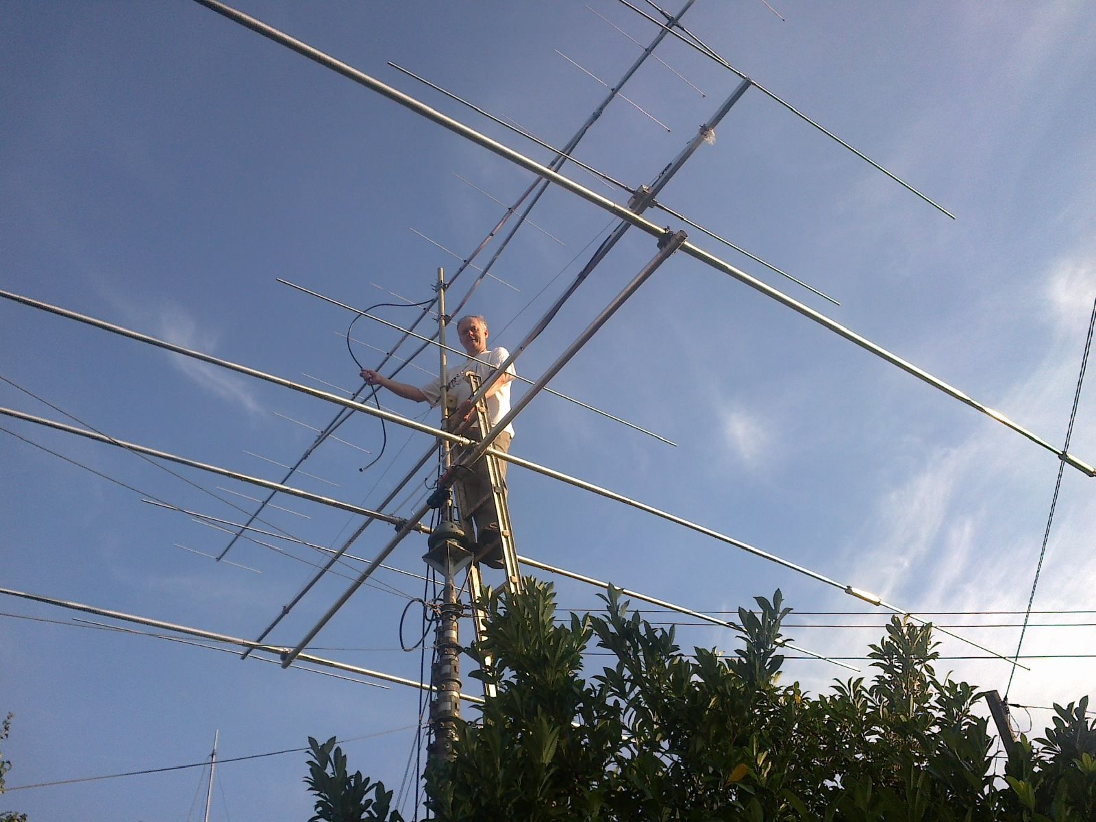 HA1XY Bela on his new antenna mast.